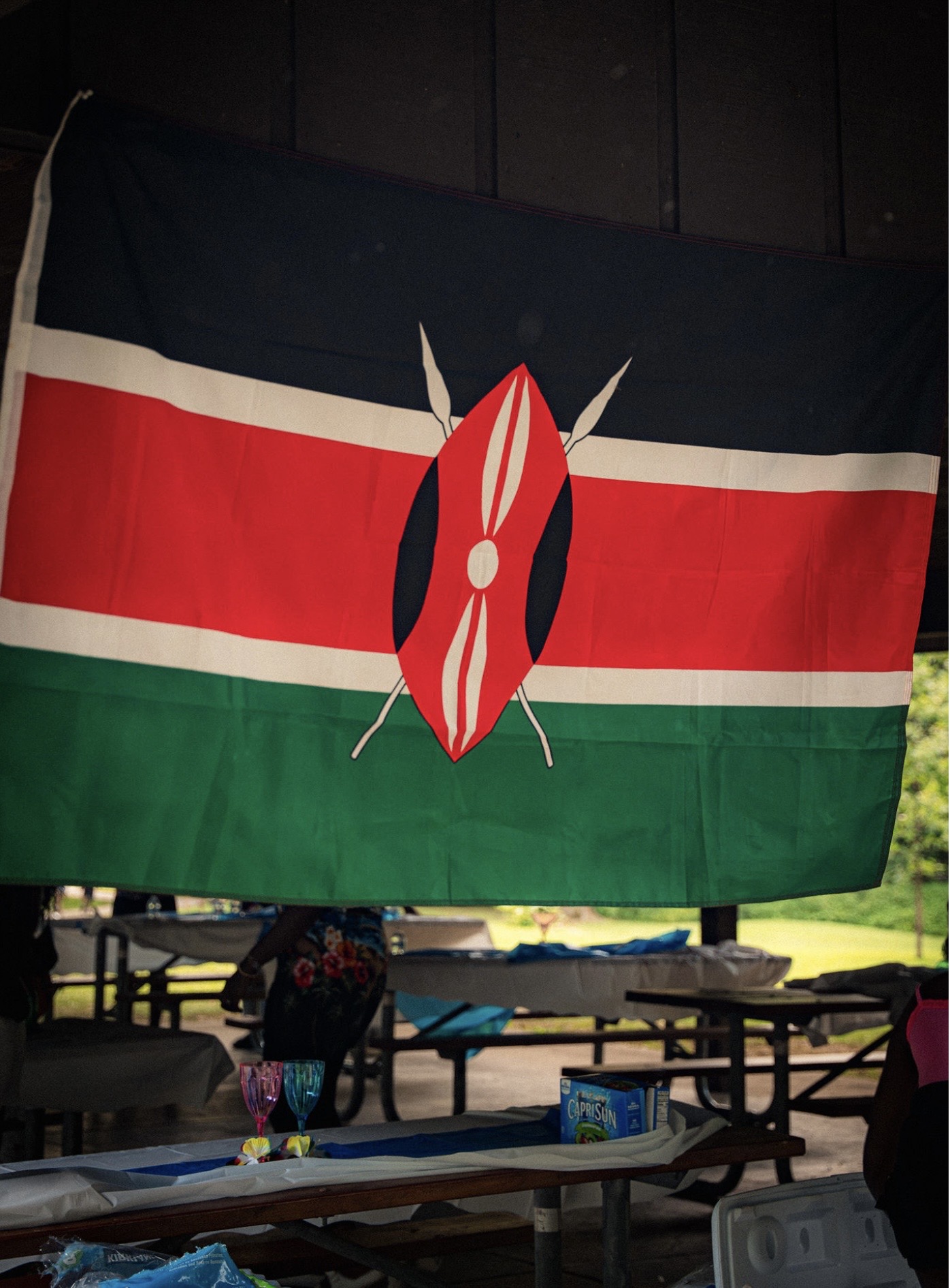 The Kenyan flag hangs over the celebration